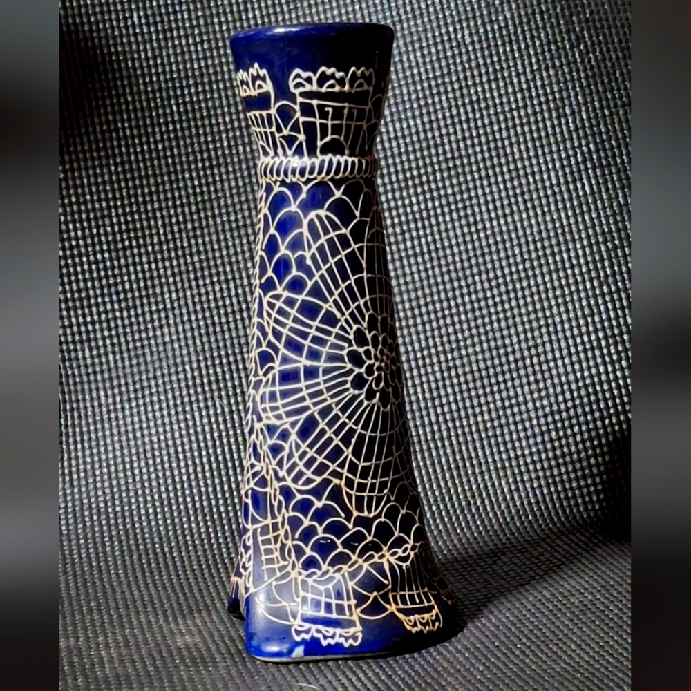A vintage asin candle holder